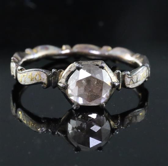 A George II gold, white enamel and rose cut diamond set mourning ring, with rock crystal panel en verso containing hair?, size H.